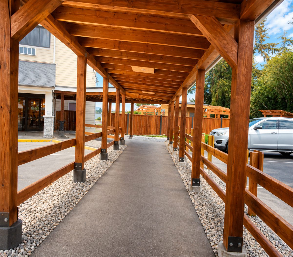 Covered wooden passage from parking toward the Parksville waterfront