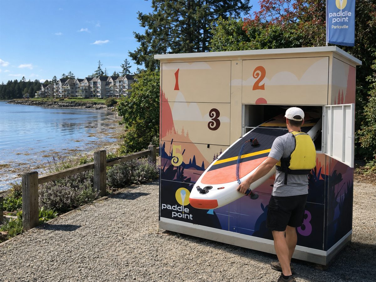 Paddler removing a paddleboard from the Parksville PaddlePoint locker